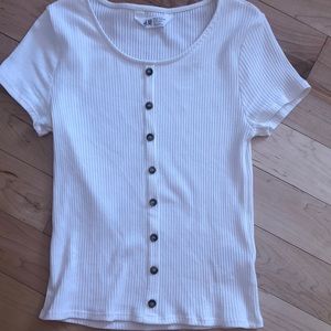 white buttoned t-shirt